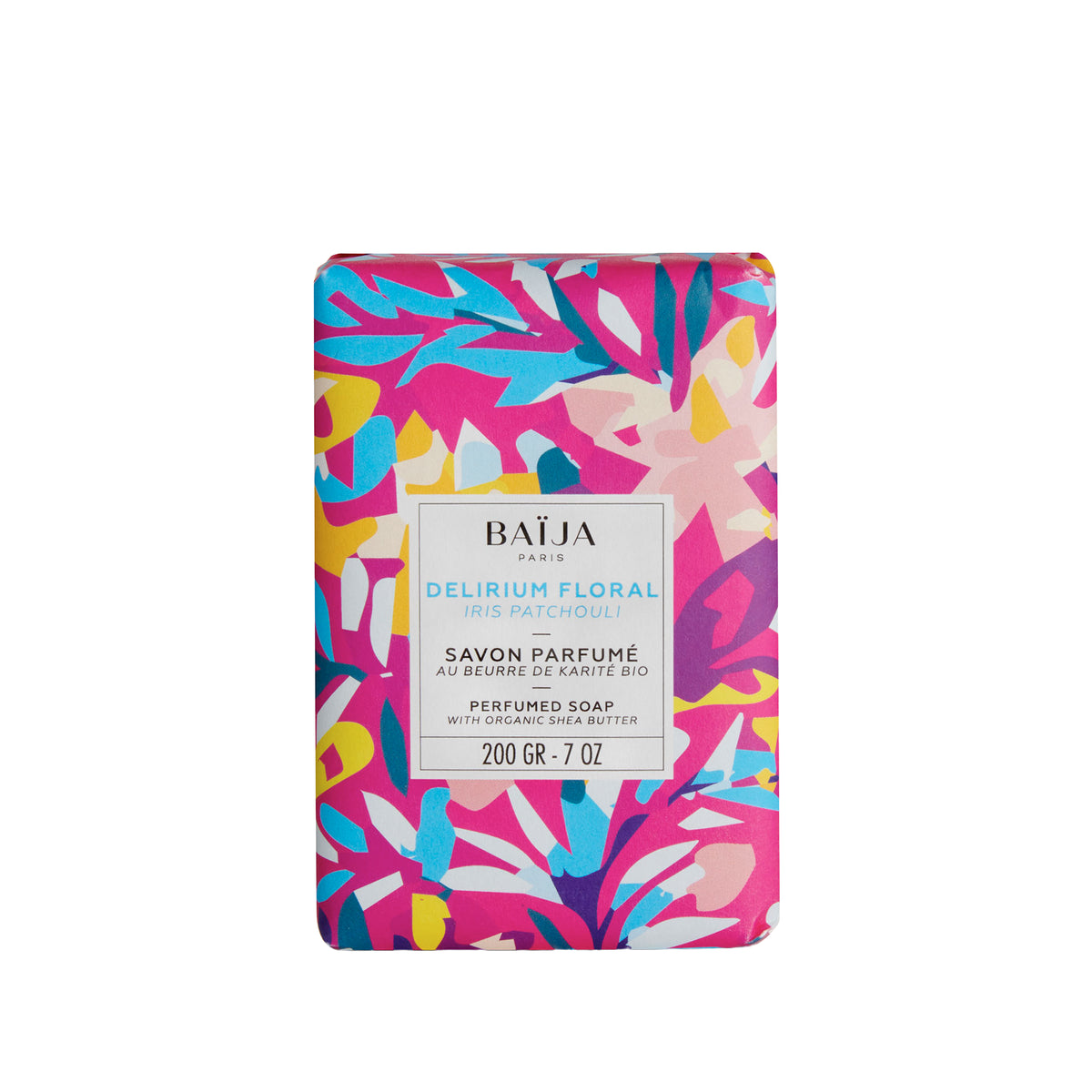 Pain de savon parfumé BAÏJA “Delirium Floral” iris patchouli, enrichi en beurre de karité bio, emballé dans un papier graphique rose, bleu et jaune, photo sur fond blanc.