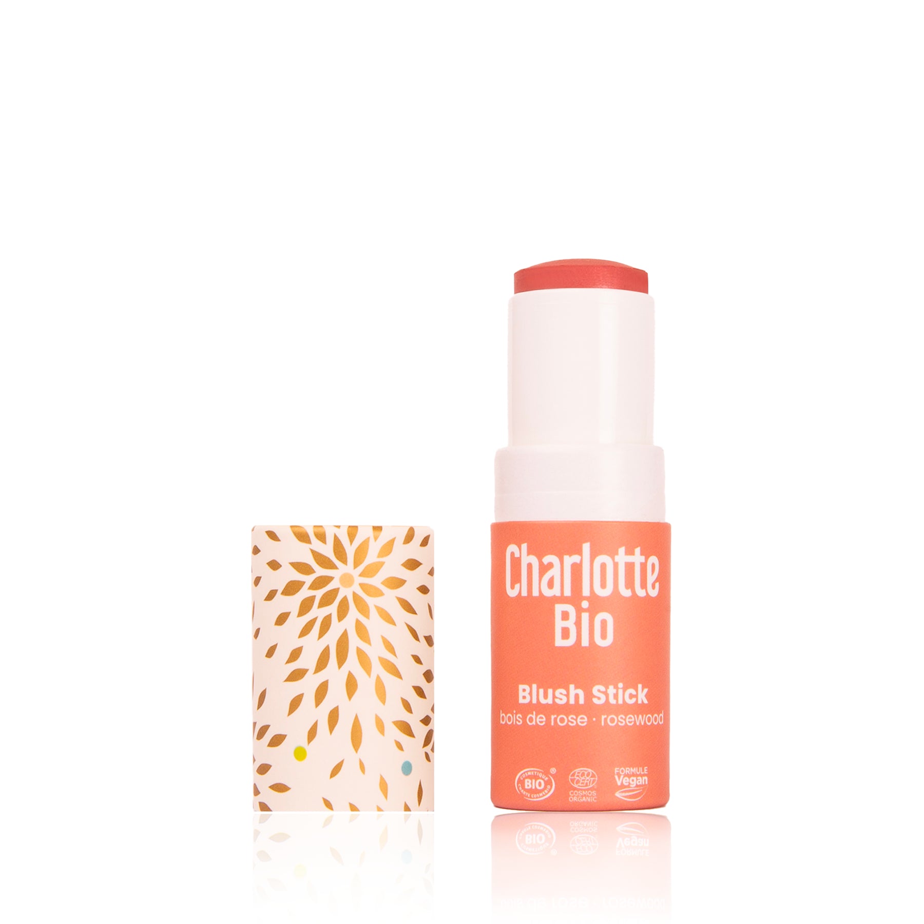 Blush stick bio Charlotte Bio teinte bois de rose, format nomade rose corail avec capuchon illustré, maquillage naturel pour un effet bonne mine.