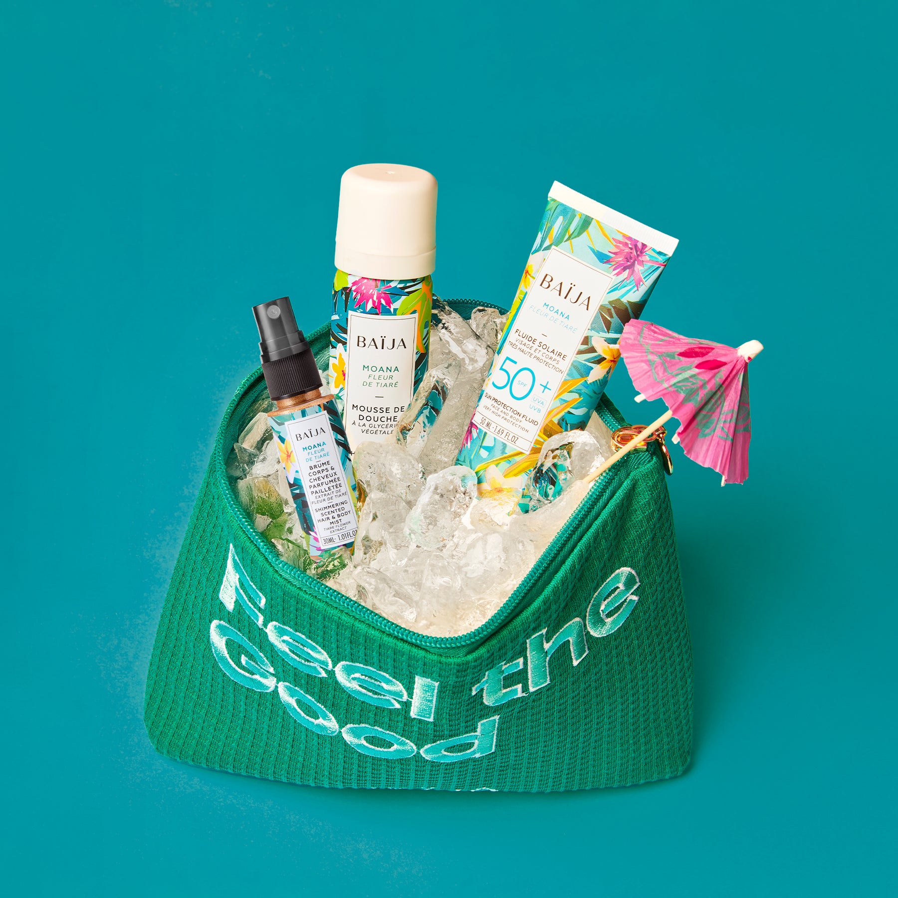Coffret solaire Baïja Moana avec trousse offerte, comprenant mousse de douche, fluide solaire SPF50+ et brume corps & cheveux pailletée.
