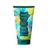 Tube de fluide solaire SPF50+ Baïja, très haute protection UVA UVB pour visage et corps, packaging tropical coloré sur fond blanc