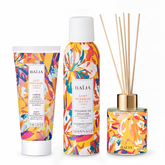 Rituel parfumé Baïja Lost Paradise réunissant crème corps, mousse de douche et diffuseur de parfum aux notes d’ananas et de fève tonka.